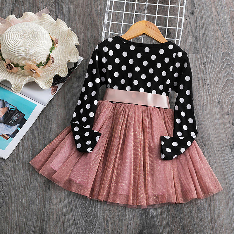 Girls' polka dot cotton dress shown on a child