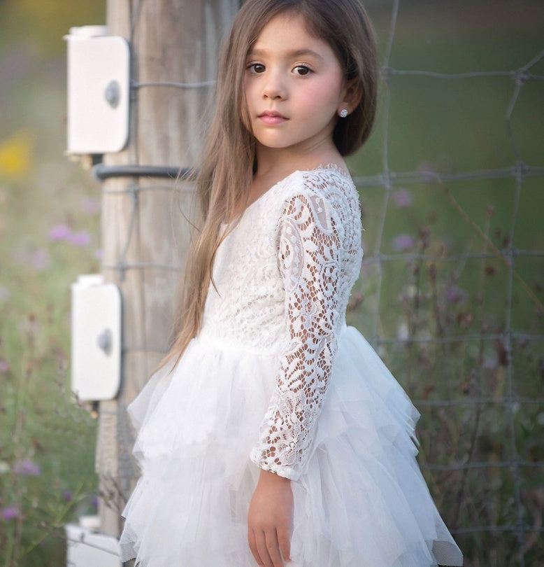 Girls' long-sleeve lace dress shown full length on a child
