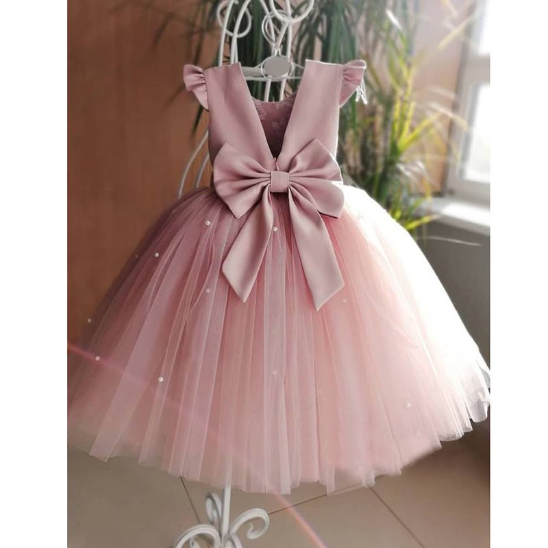 Detail of the skirt and hem on the Marktox girls' cotton flower girl maxi dress