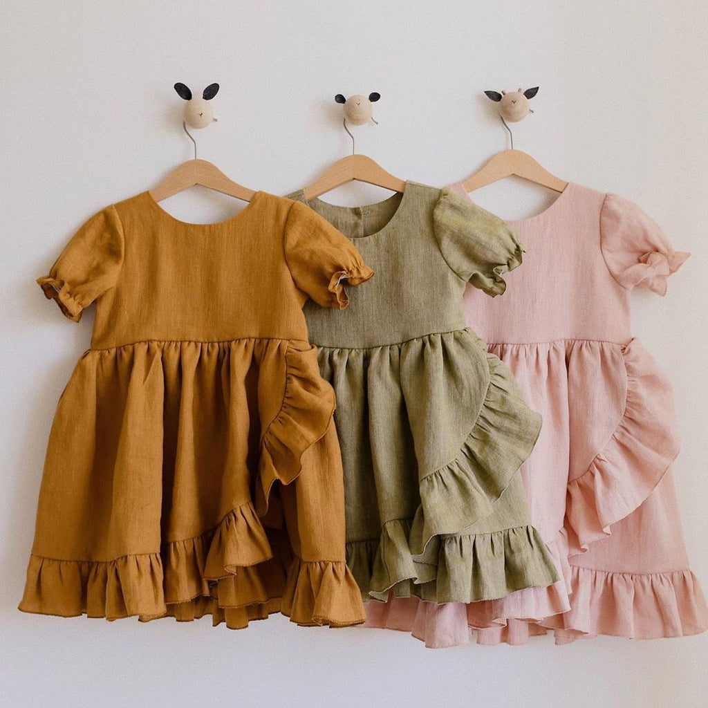 Detail of the skirt and hem on the Marktox girls' cotton-linen ruffle dress
