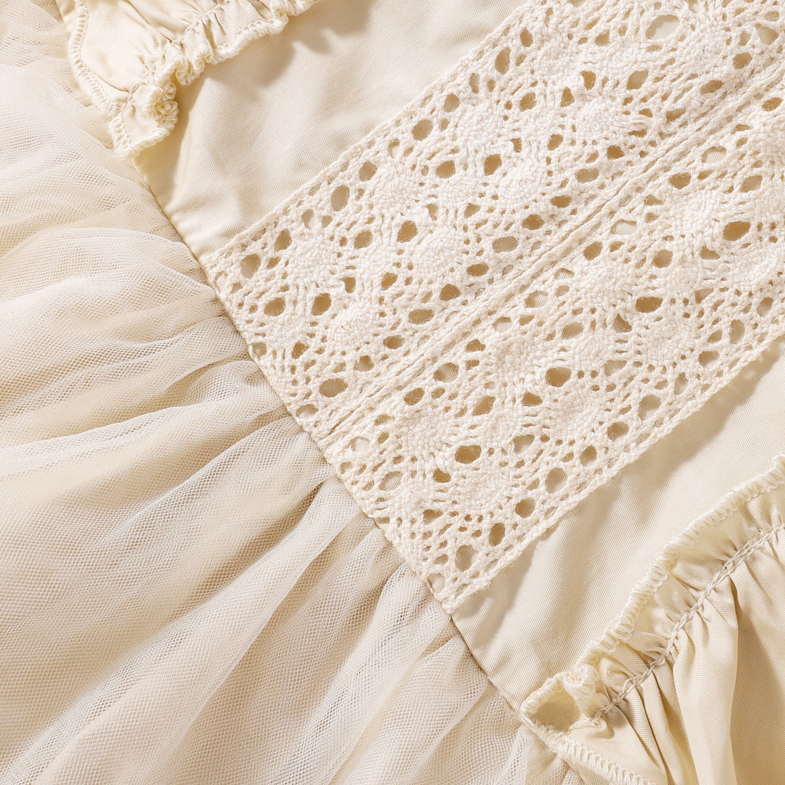 Detail of the skirt and hem on the Marktox girls' apricot cotton summer dress