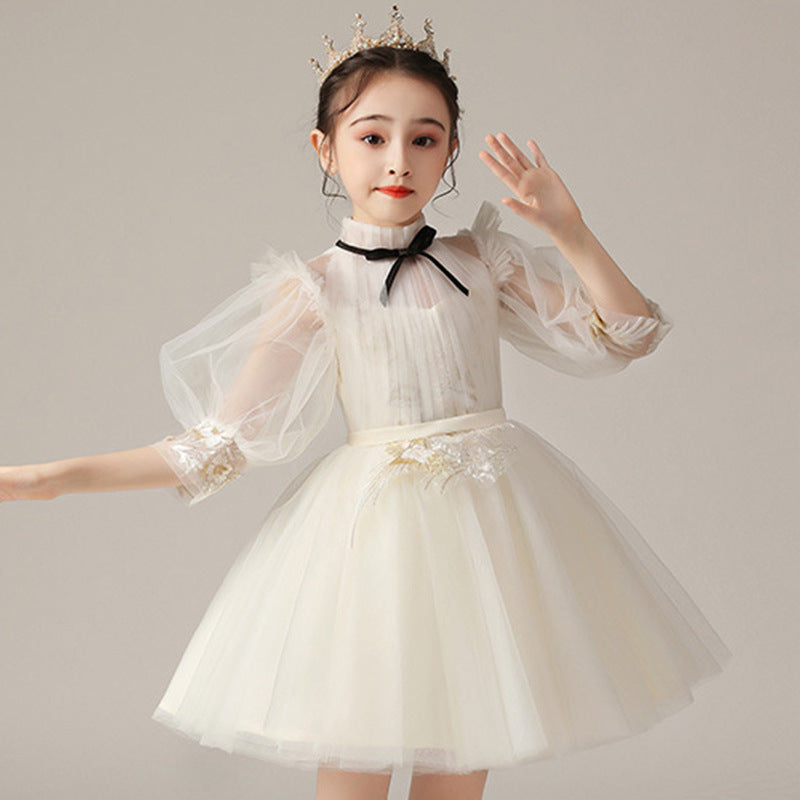 Detail of the skirt and hem on the Marktox girls' lace wedding party dress