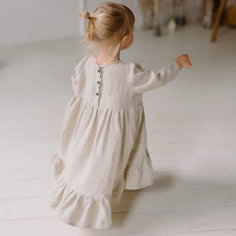 Detail of the skirt and hem on the Marktox girls' cotton-linen tiered dress