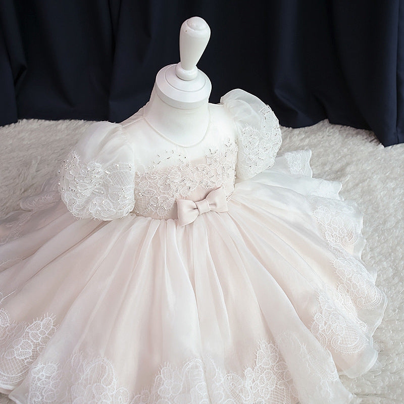Girls' light pink tulle party dress shown full length
