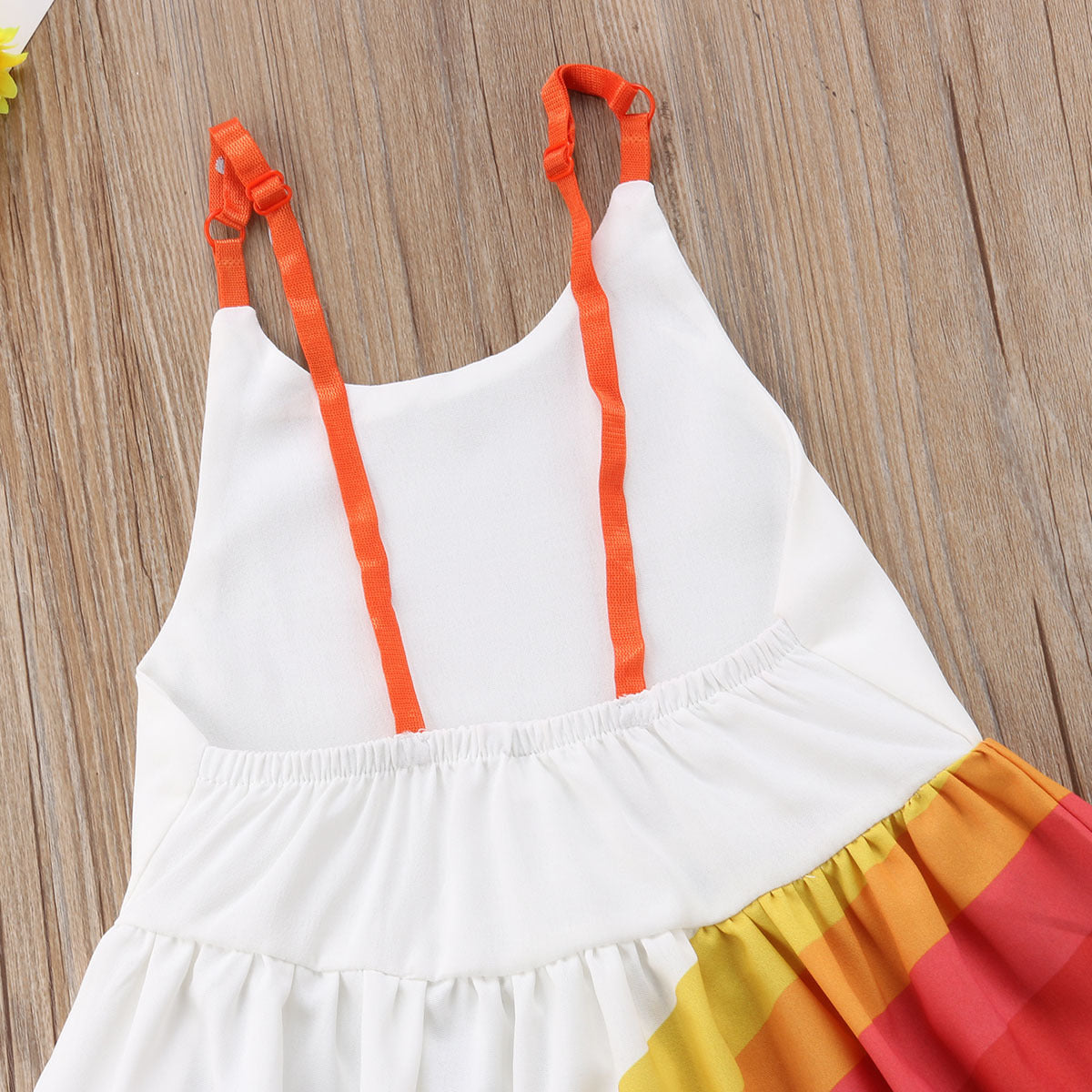 Girls' rainbow stripe summer dress, back view