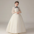 Close view of the fabric on the Marktox girls' lace wedding party dress