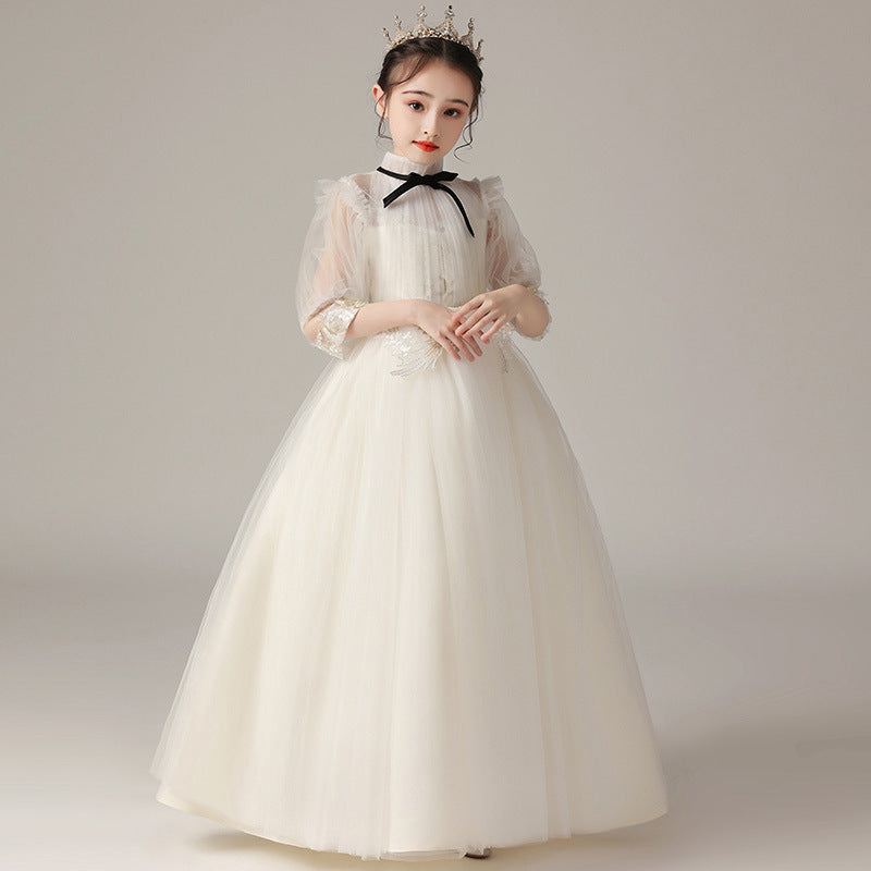 Close view of the fabric on the Marktox girls' lace wedding party dress