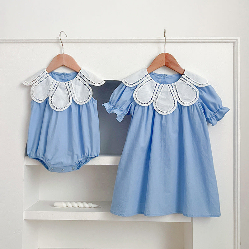 Girls' sleeveless cotton dress shown on a child