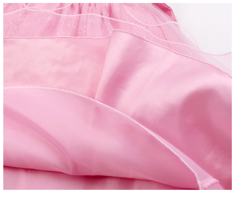 Detail of the full-skirt party dress showing the gathered skirt and waist seam