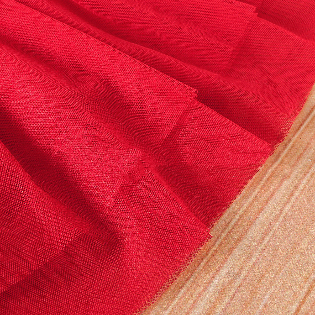 Close-up of the waist bow and mesh overlay on the Marktox girls' red holiday dress
