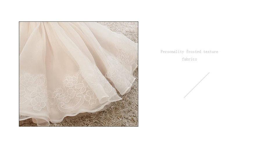 Back view of the Marktox girls' light pink tulle party dress