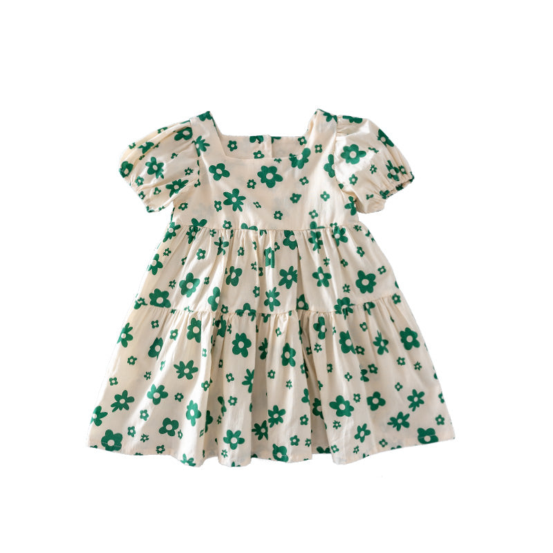 Marktox girls' pleated cotton dress in green floral, shown on a child
