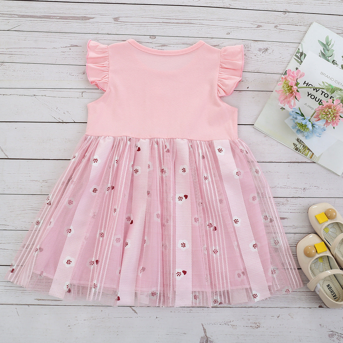 Close-up of the bunny motif and mesh skirt on the Marktox girls' Easter dress