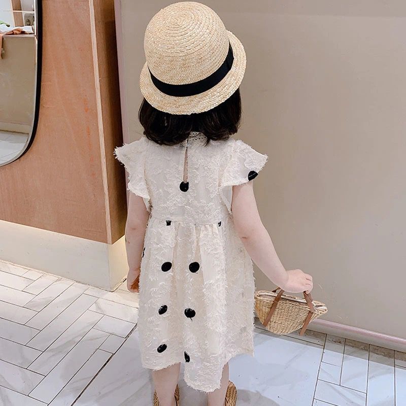 Off-white cotton summer dress for girls shown on a child