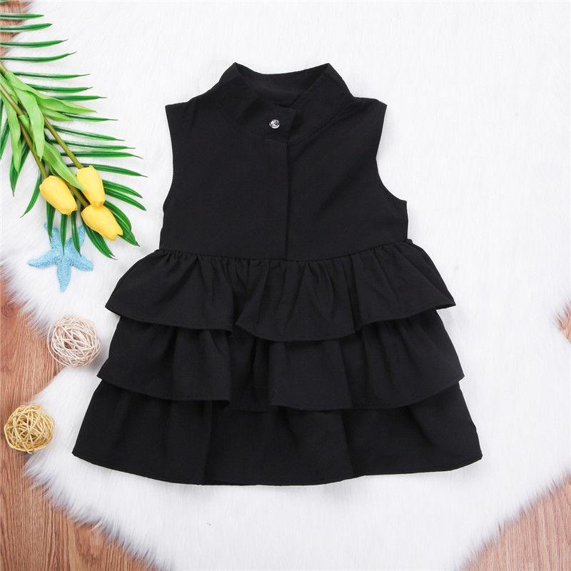 Detail of the neckline and shoulder on the Marktox girls' sleeveless dress