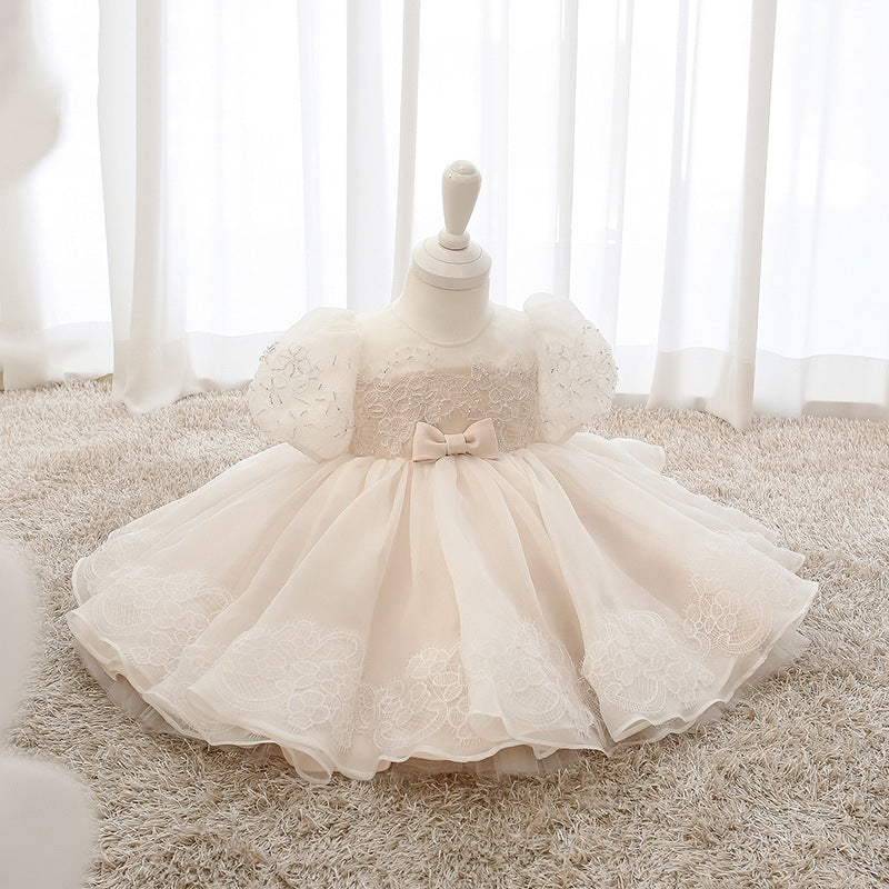 Detail of the skirt and hem on the Marktox girls' light pink tulle party dress